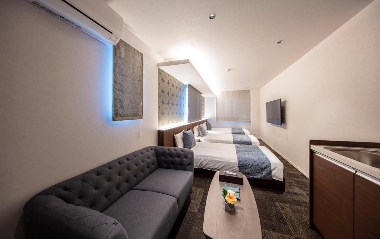 Aparthotel Grand Base Okayama Ekimae Esterno foto
