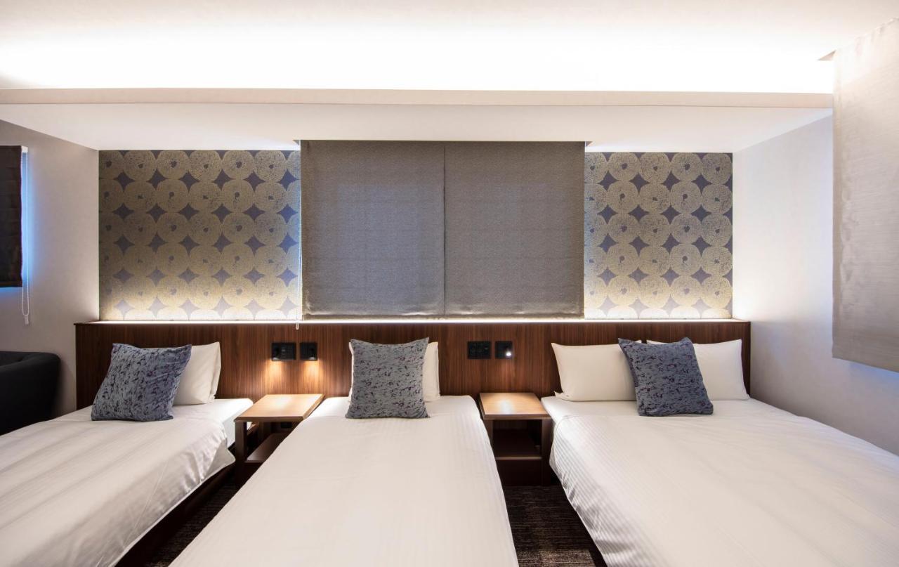 Aparthotel Grand Base Okayama Ekimae Esterno foto
