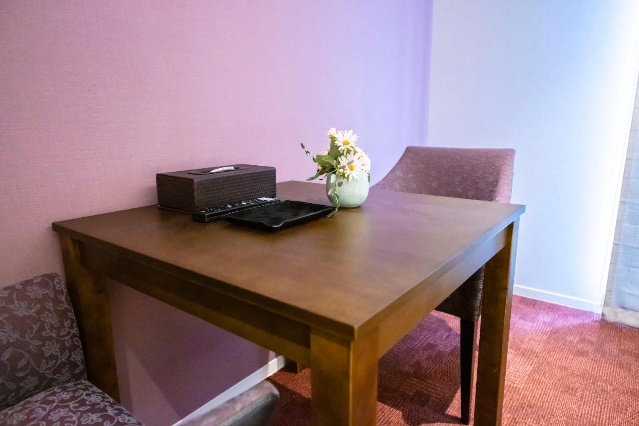 Aparthotel Grand Base Okayama Ekimae Esterno foto