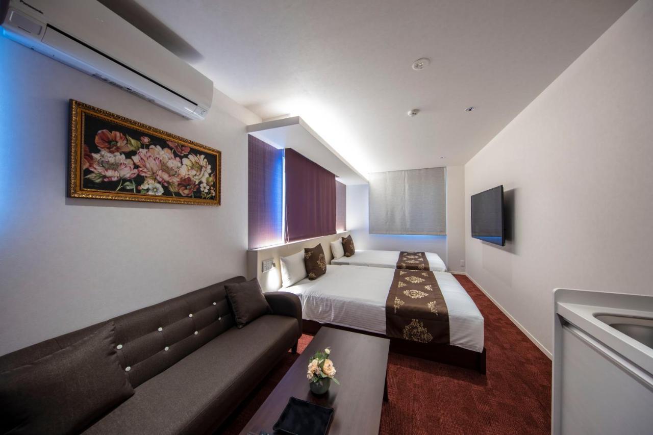 Aparthotel Grand Base Okayama Ekimae Esterno foto