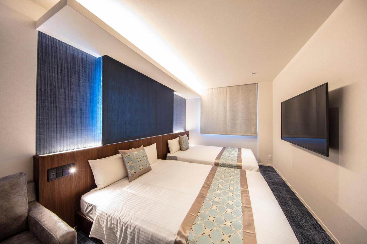 Aparthotel Grand Base Okayama Ekimae Esterno foto