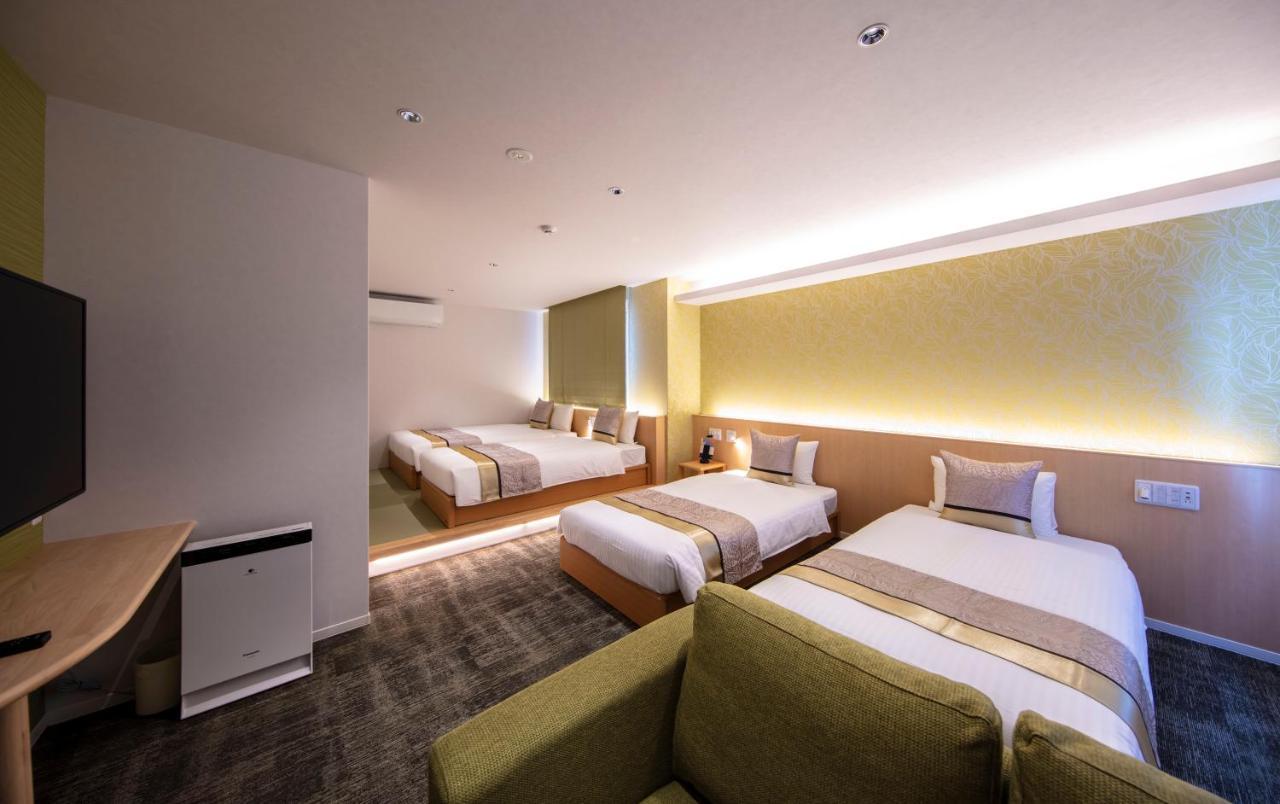 Aparthotel Grand Base Okayama Ekimae Esterno foto