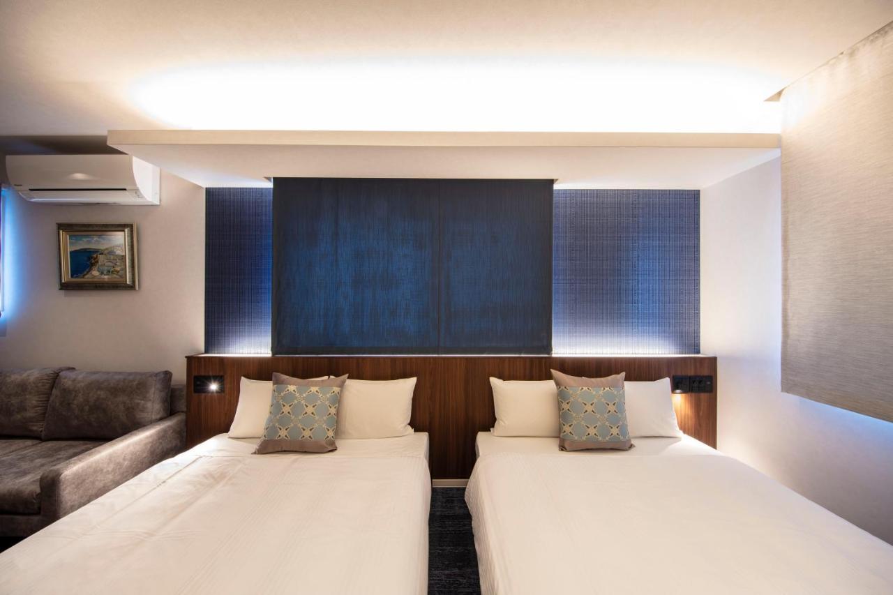 Aparthotel Grand Base Okayama Ekimae Esterno foto